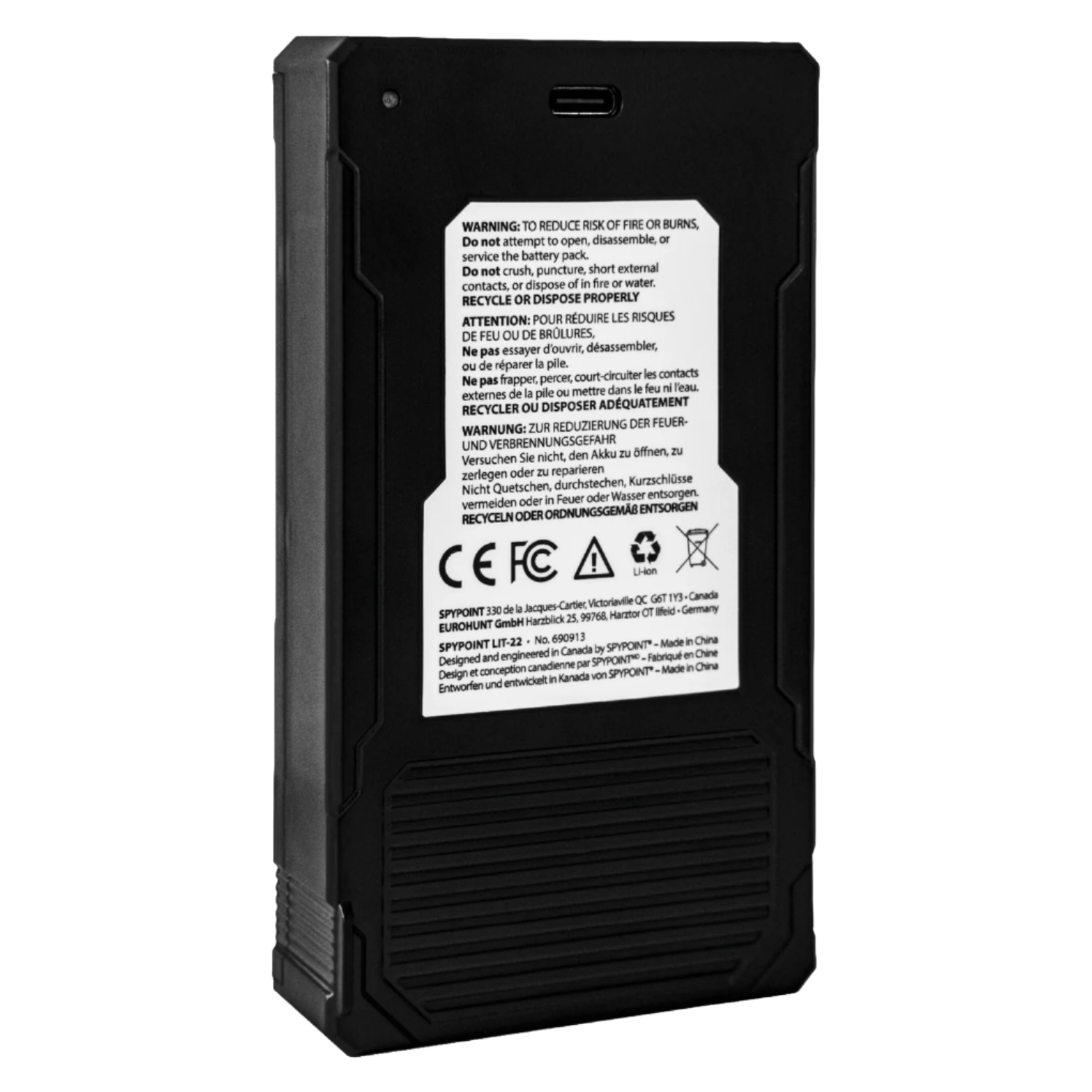 Angled rear view of SPYPOINT LIT-22 lithium battery showing safety warnings, certification icons, and usage instructions printed on the back label